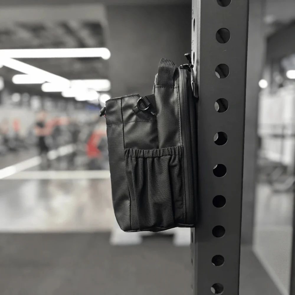 Sac de sport magnétique pour hommes et femmes avec porte-bouteille et compartiment ventilé en vrac.